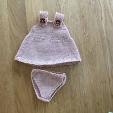 Handgestrickte Kleidung f