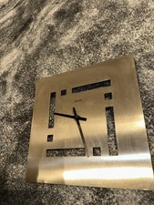 Norvel Wanduhr aus Edelmetall