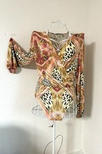 Außergewöhnlicher Bodysuit Mega Farbspiel & variables verführerisches Dekolleté