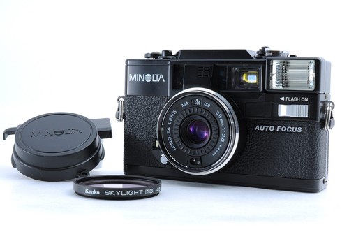 Fast neuwertig minolta - [fast, neuwertig]