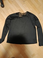 Schwarzes teils rückenfreies Langarmshirt. Gr. XL. Neu