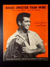 KISSES SWEETER THAN WINE -