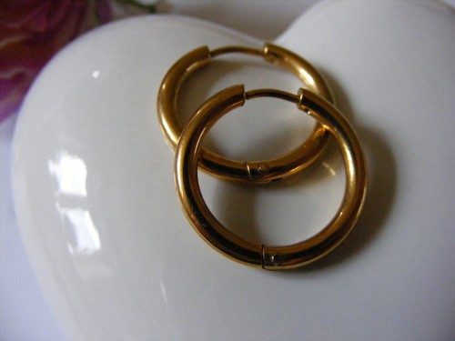 Modische goldene creolen - goldene,
