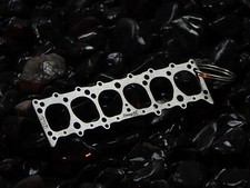 Schlüsselanhänger: Miniatur einer Kopfdichtung für Chevrolet Stovebolt 216 / 235