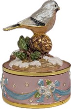 Vogelfigur auf rosa Basis