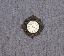 Miniatur schwarze Wanduhr für