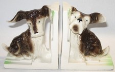 Porzellan Buchstützen-Paar