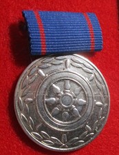 DDR Medaille mit Steuerrad / Für TD in der Binnenschifffahrt Stufe silber