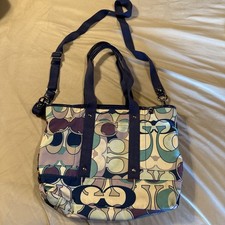 AUTHENTIC COACH KYRA DAISY