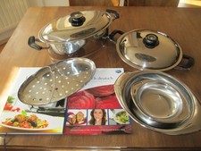 AMC Kochtopf Set Bräter oval, rund mit Deckel 2 Servierplatten, 2 Kochbücher