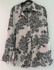 Beige/Schwarz gemusterte