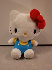 Plüsch Stofftier: Sanrio Hello Kitty 20 cm groß mit blauer Latzhose