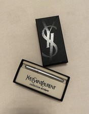 2× Yves Saint Laurent