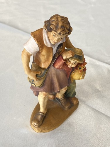 Krippenfigur hirte mit junge - mit,