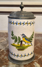 Walzenkrug "Vogelmotiv"  Deckel mit Münzmotiv