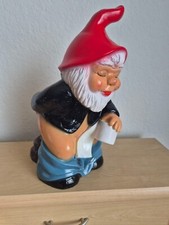 Gartenzwerg Scheißer mit Kackhaufen