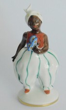 Porzellanfigur Kind mit