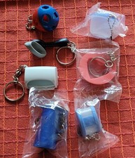 verschiedene Schlüsselanhänger von Tupperware - gebraucht - Dosenöffner etc.