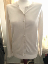 Schicke, weisse Strickjacke