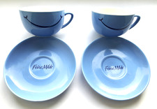 2- schöne Keramik Tassen mit Untertassen- Tchibo Feine Milde- Blau