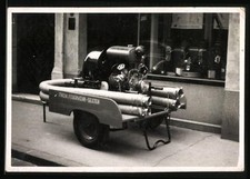 Fotografie Anhäger mit Pumpe und Schlauch der Freiwiligen Feuerwehr Sexten 