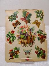 Blatt beklebt mit 12 Oblaten Glanzbildchen Schmetterlinge Blumen Vintage um 1900