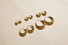 Breite chunky Creolen aus