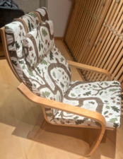 Wippstuhl Holzfarben mit Eichelmusterbezug 90*80*70