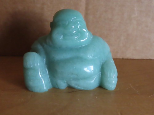 Budda sitzt lächelt - , grüner