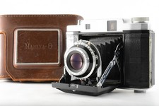 Neuwertige analoge - n,
