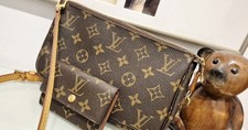 LOUIS VUITTON Pochette mit