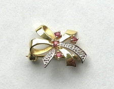 Brosche Schleife mit Diamant + roter Spinell bicolor Gold 333 Gelbgold  (3007)