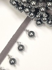 Graue Perle Perlenquaste