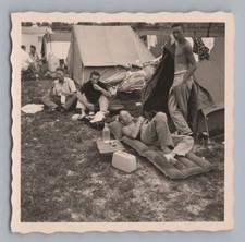 Young Men Camping on Lake