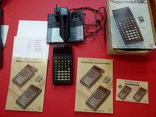 Texas Instruments TI-58C komplett mit allem Zubehör und 35 Programmierkarten