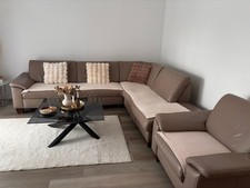 Eckcouch aus Leder mit Sessel und Schlaffunktion