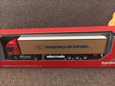 Herpa H0 1:87 in OVP 309516 Iveco Stralis XP Gardinenplane "Multipli Arcese" (I)