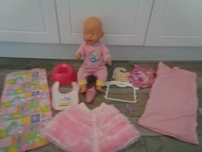 baby born Konvolut-Rosa Augen Puppe+Töpfchen,Flasche,Kleidung,Wickelauflage,Lätzchen,Decke+