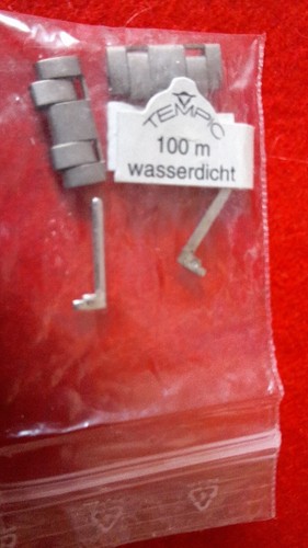 Ersatzglieder für eine - uhr,