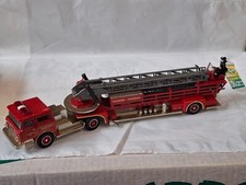 Corgi. (China) Mack Aeriel Fire Truck American la France rot