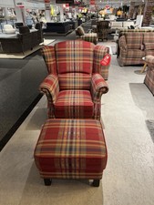 Solitär Sessel mit Hocker