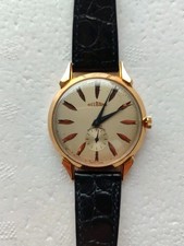 HERRENUHR 18K GOLD. 0,750