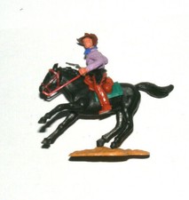 Timpo Toys Cowboy Figur Reiter schwarzes Pferd lila Hemd Pistole
