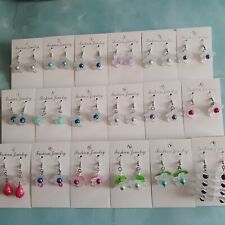 Ohrringe Handarbeit, Unikat, Blütenanhänger semitransparent mit Perlen