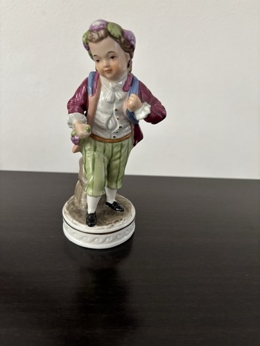 Antike porzellanfigur junge - porzellanfigur,