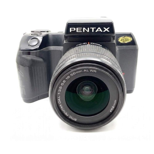 Pentax sf7 - +,