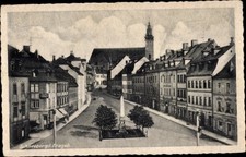 Ak Schneeberg im Erzgebirge, Straßenpartie, Häuser, Kirche - 3775457