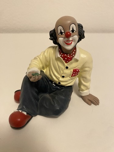 Gilde clown figur sitzend mit - clown,