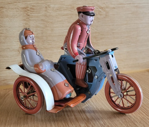 Blechspielzeug motorradfahrer - blechspielzeug,