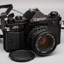 working  CANON A-1 with squeak + FD 50mm f/1.8